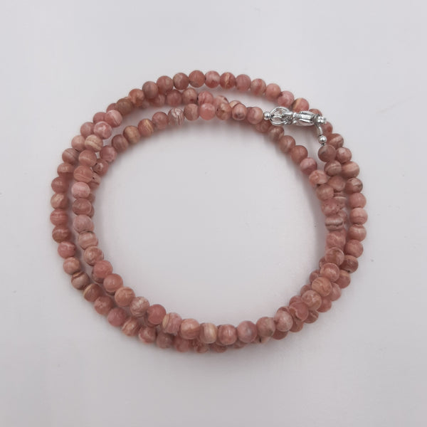 Rhodochrosite triple